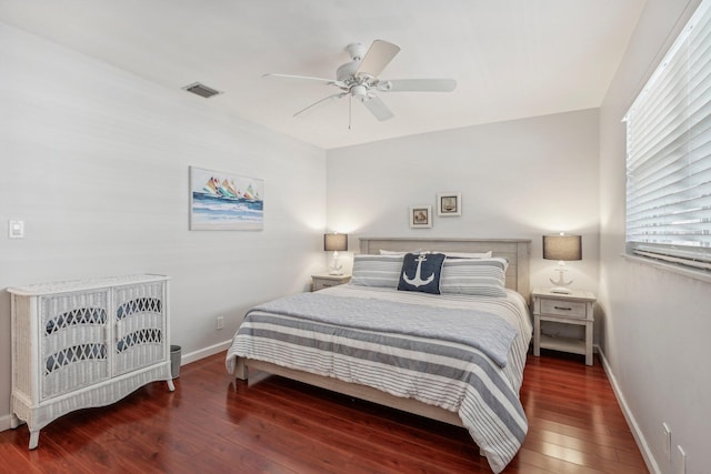 bedroom featuring dark wood-type flooring and ceiling fan