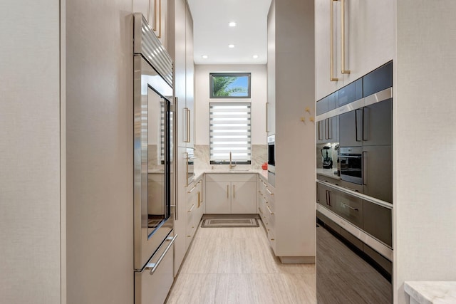 kitchen with sink and backsplash