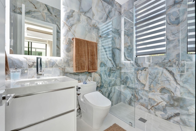 bathroom featuring tile walls, vanity, toilet, and walk in shower