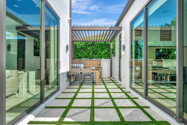 200 NE 6th St, Boca Raton, FL 33432 - exterior space with an outdoor kitchen and a pergola