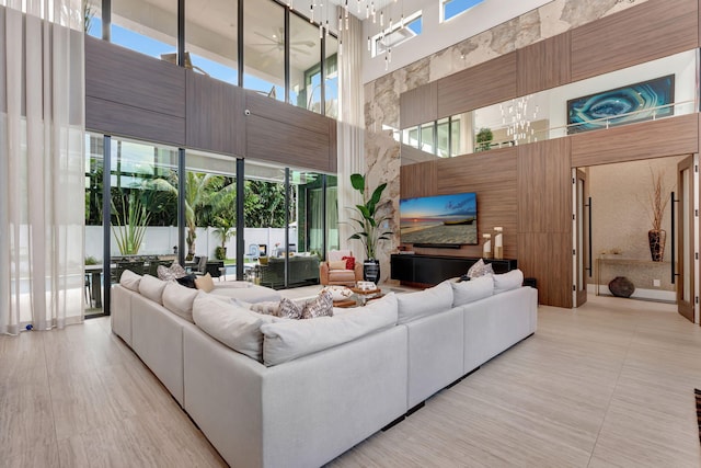 tiled living room with a high ceiling