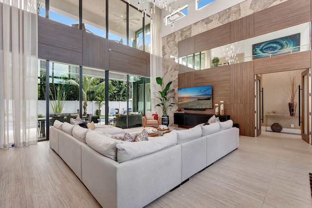 200 NE 6th St, Boca Raton, FL 33432 - living area featuring a healthy amount of sunlight and a high ceiling