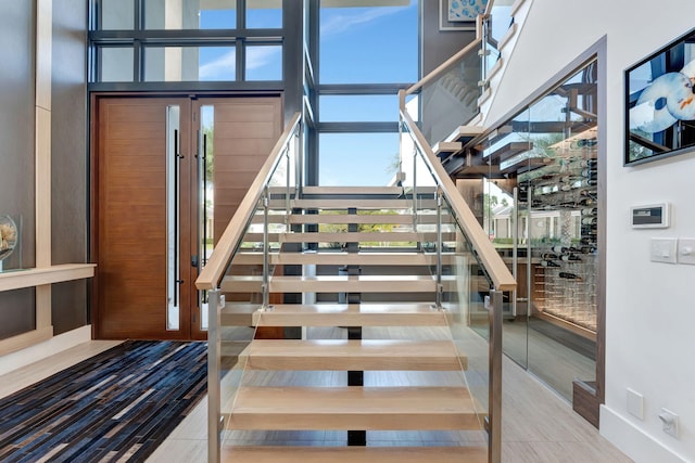 stairs with tile patterned floors