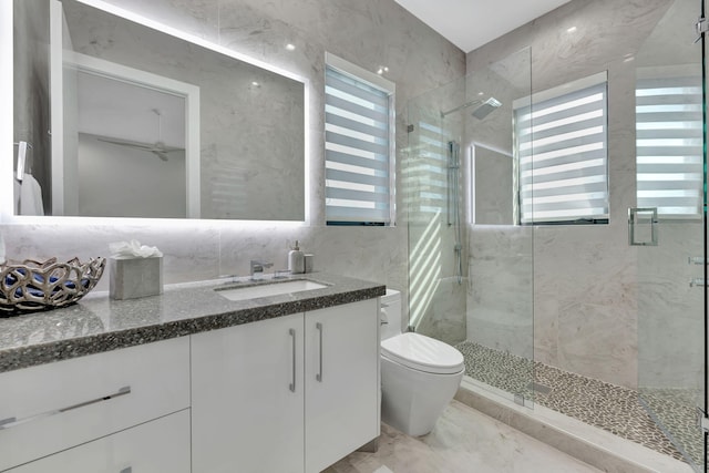 200 NE 6th St, Boca Raton, FL 33432 - full bath featuring a shower stall, marble finish floor, vanity, and toilet
