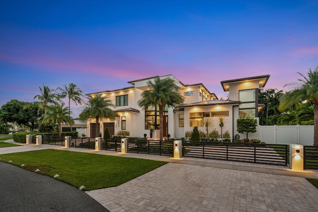 contemporary house featuring a lawn