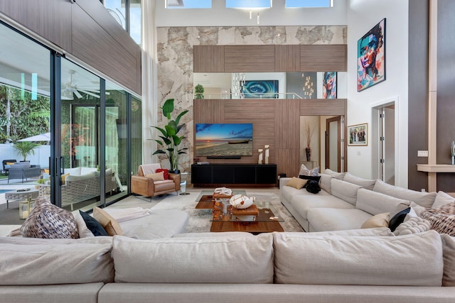 living room featuring a high ceiling