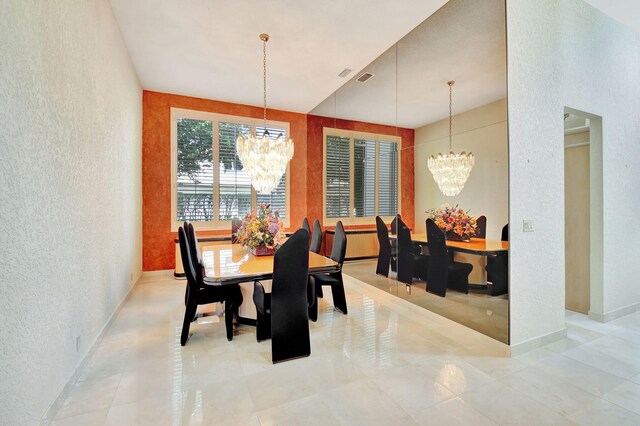 tiled living room with ceiling fan and a towering ceiling