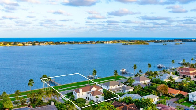 aerial view featuring a water view and a residential view