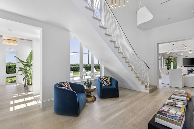 living room with light hardwood / wood-style flooring