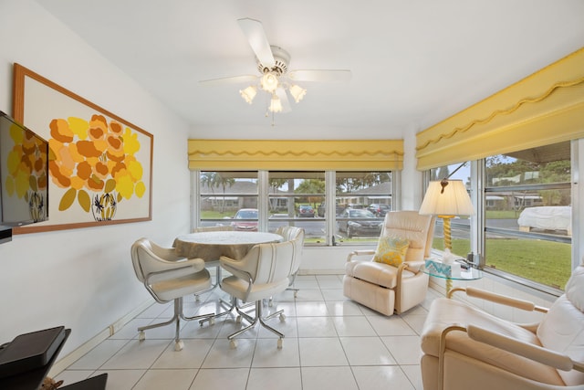 sunroom / solarium with ceiling fan