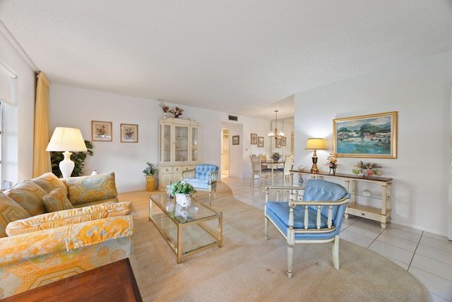 tiled living room with a chandelier