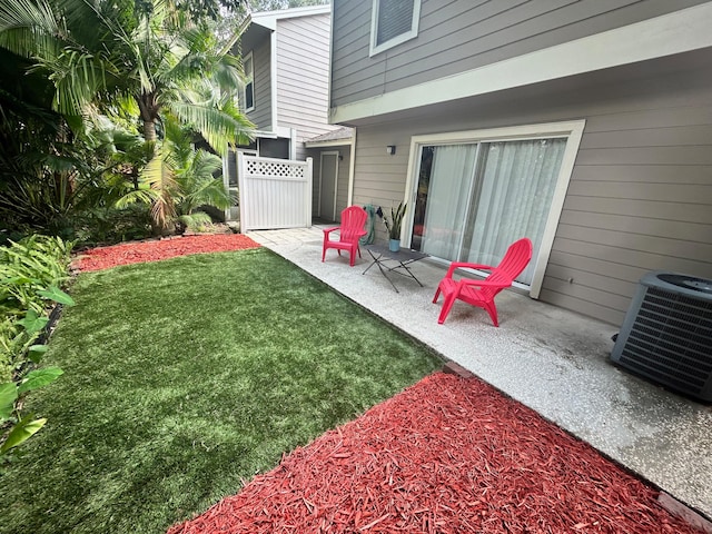 view of yard with a patio and cooling unit