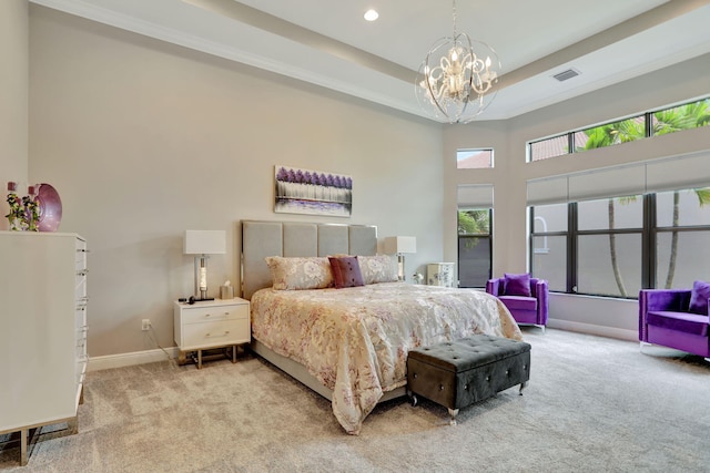 carpeted bedroom with a high ceiling, an inviting chandelier, and multiple windows