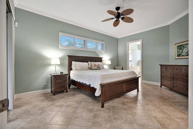 bedroom featuring ceiling fan, ornamental molding, and ensuite bath