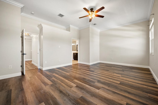 spare room featuring ornamental molding, ceiling fan, and dark hardwood / wood-style floors