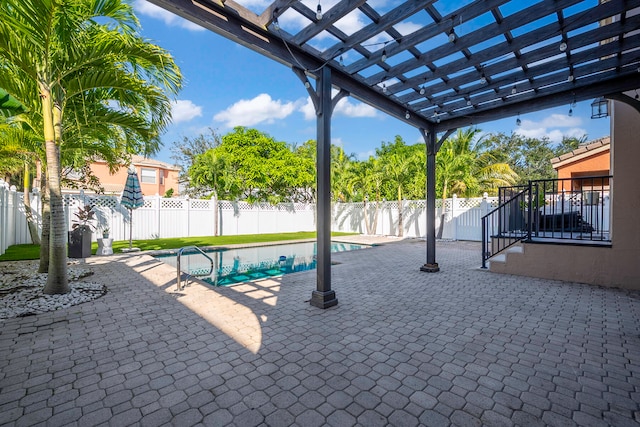 view of pool featuring a patio area and a pergola