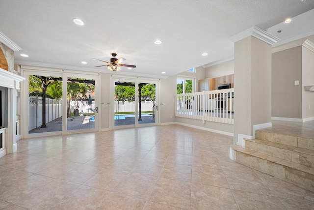 unfurnished living room featuring french doors, crown molding, light tile patterned floors, and ceiling fan