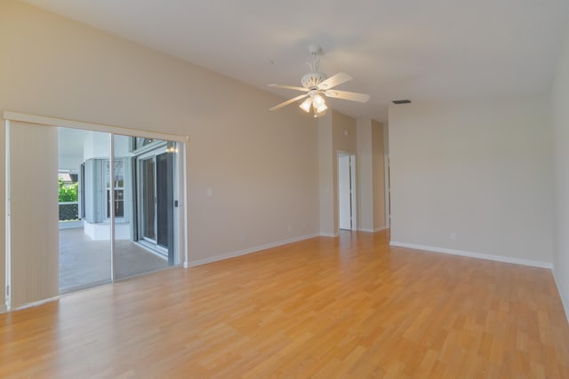 spare room featuring ceiling fan and light hardwood / wood-style flooring