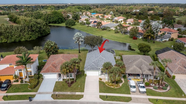 drone / aerial view with a water view