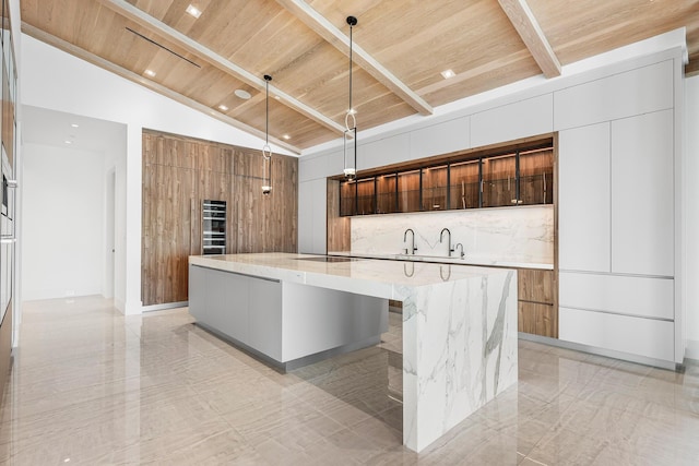 kitchen featuring decorative backsplash, a large island, modern cabinets, and wooden ceiling