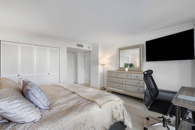 bedroom featuring ornamental molding and a closet