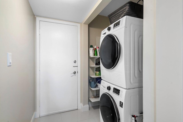 laundry room featuring stacked washer / dryer