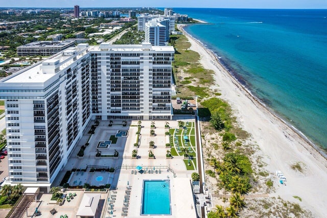 aerial view featuring a view of the beach and a water view