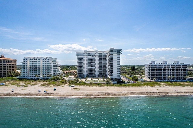 drone / aerial view with a view of the beach and a water view