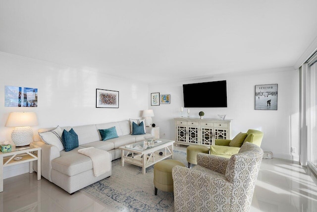 living room with light tile patterned floors and ornamental molding