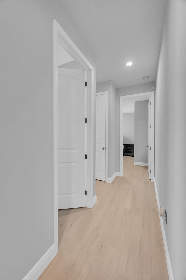 hallway featuring light hardwood / wood-style floors