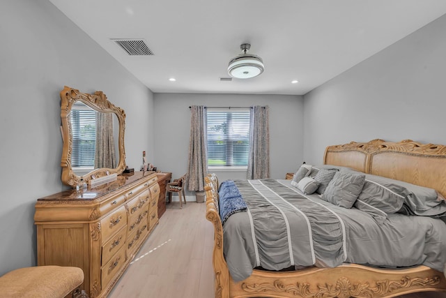 bedroom featuring light wood-type flooring