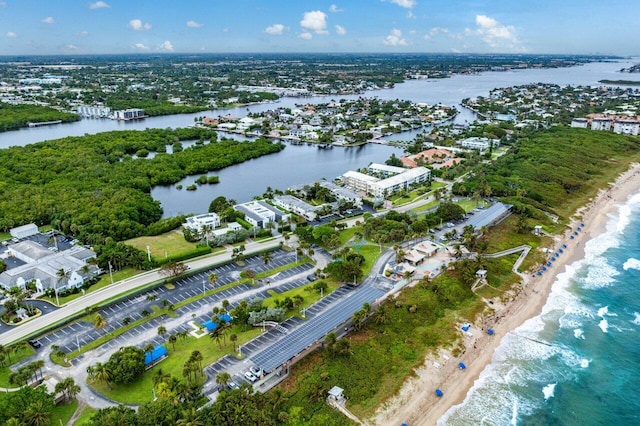 aerial view featuring a water view and a view of the beach