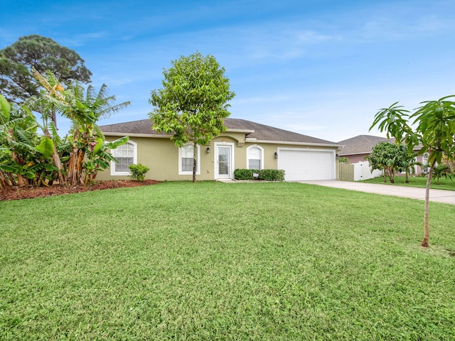 ranch-style home with a front yard and a garage