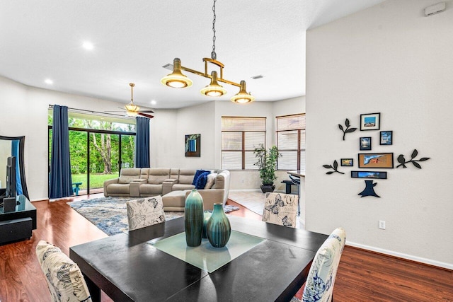 dining space featuring dark hardwood / wood-style floors