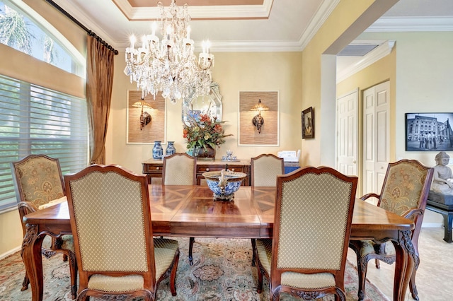 carpeted dining area with crown molding and a notable chandelier