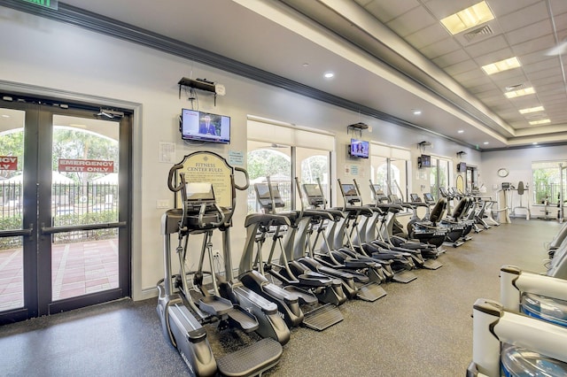 gym with french doors, healthy amount of natural light, crown molding, and recessed lighting