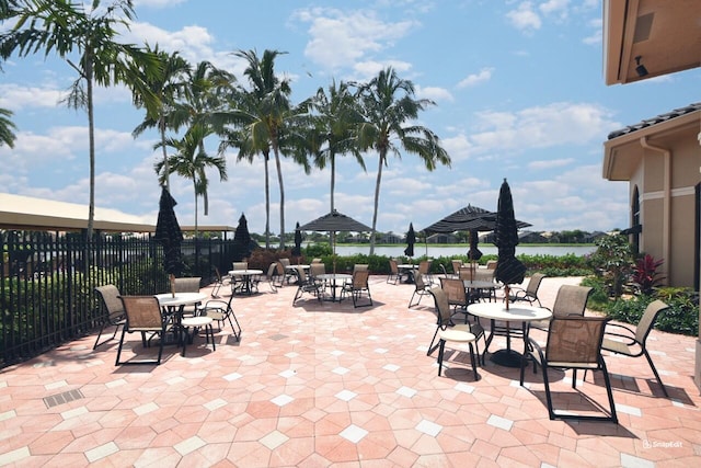 view of patio / terrace with a water view