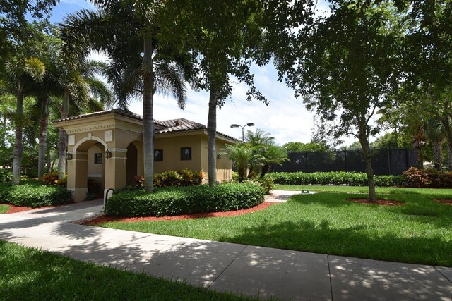 view of community featuring a yard