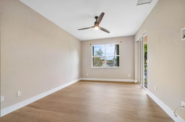 unfurnished room featuring light hardwood / wood-style floors and ceiling fan