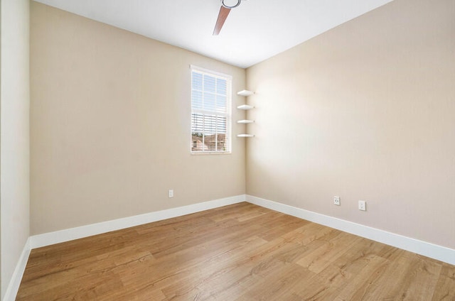 spare room with light hardwood / wood-style floors