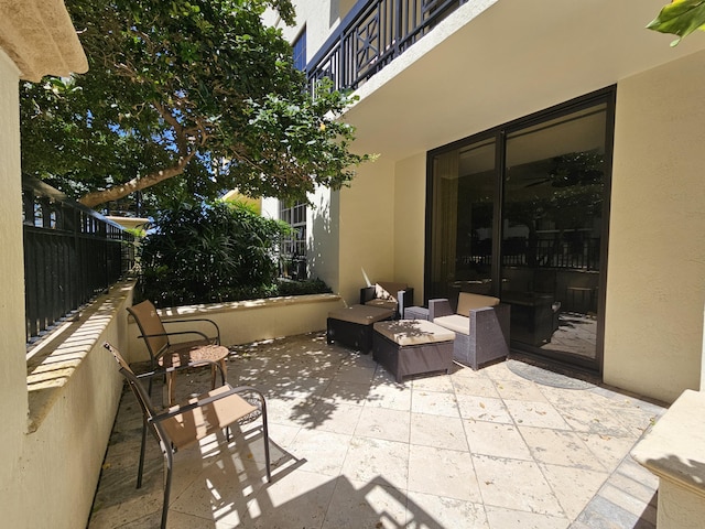 view of patio / terrace with a balcony