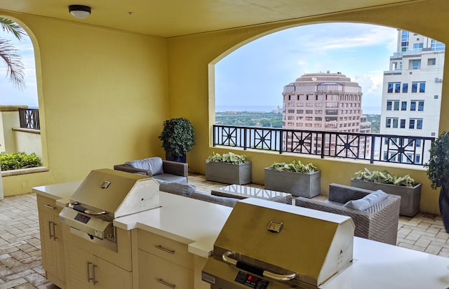 view of patio / terrace featuring an outdoor hangout area, area for grilling, and grilling area