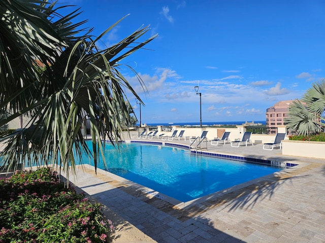 view of swimming pool featuring a patio