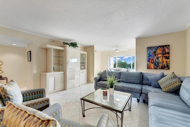 tiled living room with crown molding, a textured ceiling, and ceiling fan