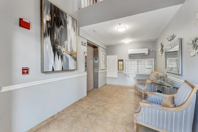 hall featuring an AC wall unit, light tile patterned floors, and mail boxes