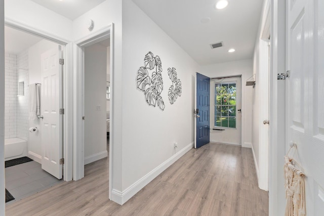 hallway featuring light wood-type flooring