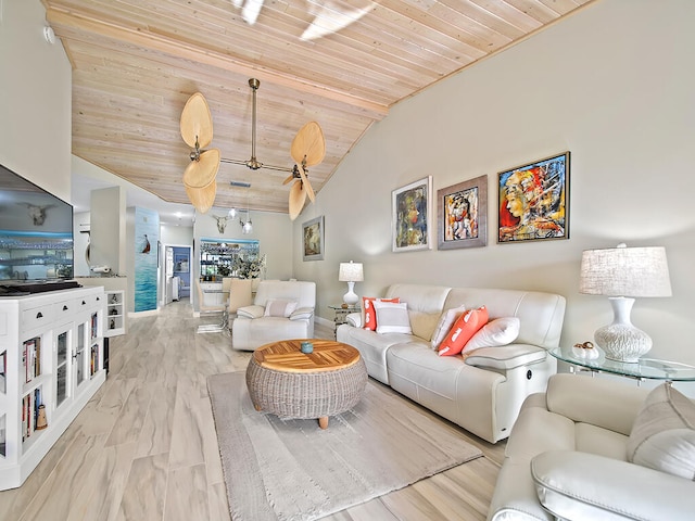 living room with vaulted ceiling, wood ceiling, and light hardwood / wood-style flooring