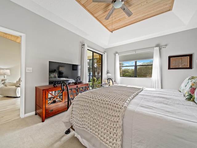 bedroom featuring access to outside, wood ceiling, ceiling fan, vaulted ceiling, and light colored carpet