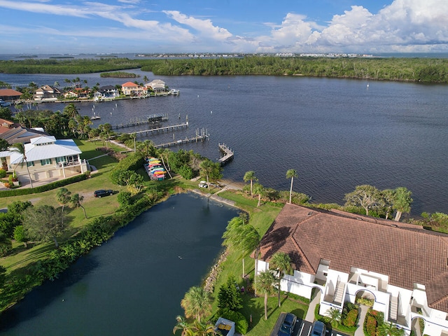 birds eye view of property featuring a water view