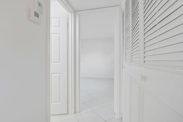 hallway with light tile patterned flooring